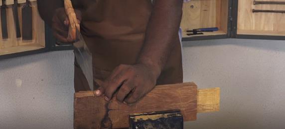 cutting wood with tenon saw